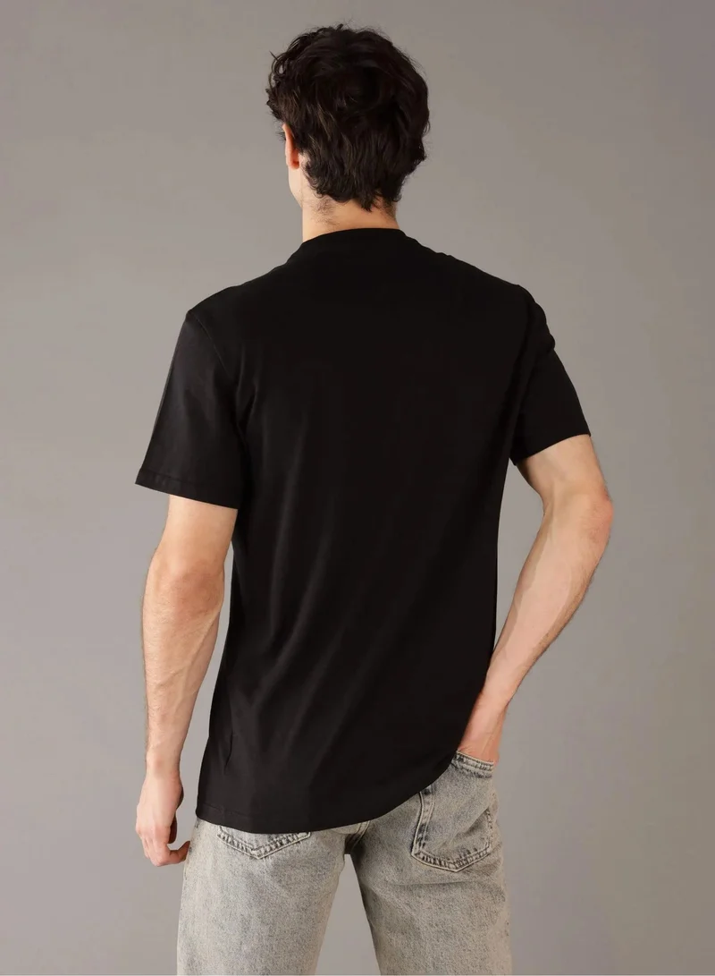 كالفن كلاين جينز تيشيرت بياقة دائرية برسومات